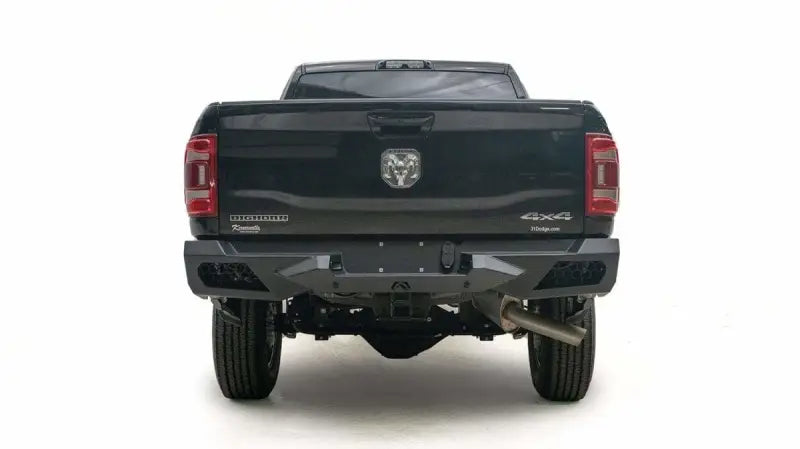 Back view of a 2019 Dodge HD truck equipped with the DR19-E4451-1 Fab Fours Vengeance Rear Bumper, showcasing its robust design and enhanced protection, ideal for RV, Automotive, Powersports, off-road, marine, exterior, truck accessories, interior, truck bed, RV parts, Bumpers, Grilles & Guards, AVADA - Best Sellers, Must Haves