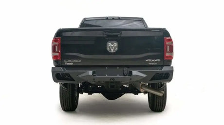 Back view of a 2019 Dodge HD truck equipped with the DR19-E4451-1 Fab Fours Vengeance Rear Bumper, showcasing its robust design and enhanced protection, ideal for RV, Automotive, Powersports, off-road, marine, exterior, truck accessories, interior, truck bed, RV parts, Bumpers, Grilles & Guards, AVADA - Best Sellers, Must Haves