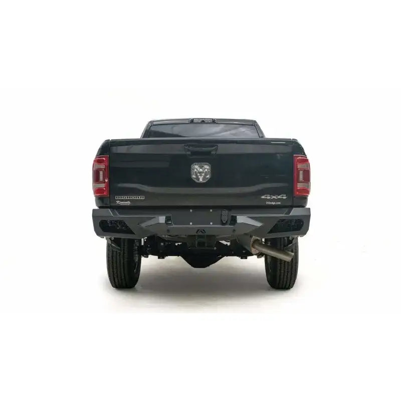 Back view of a 2019 Dodge HD truck equipped with the DR19-E4451-1 Fab Fours Vengeance Rear Bumper, showcasing its robust design and enhanced protection, ideal for RV, Automotive, Powersports, off-road, marine, exterior, truck accessories, interior, truck bed, RV parts, Bumpers, Grilles & Guards, AVADA - Best Sellers, Must Haves