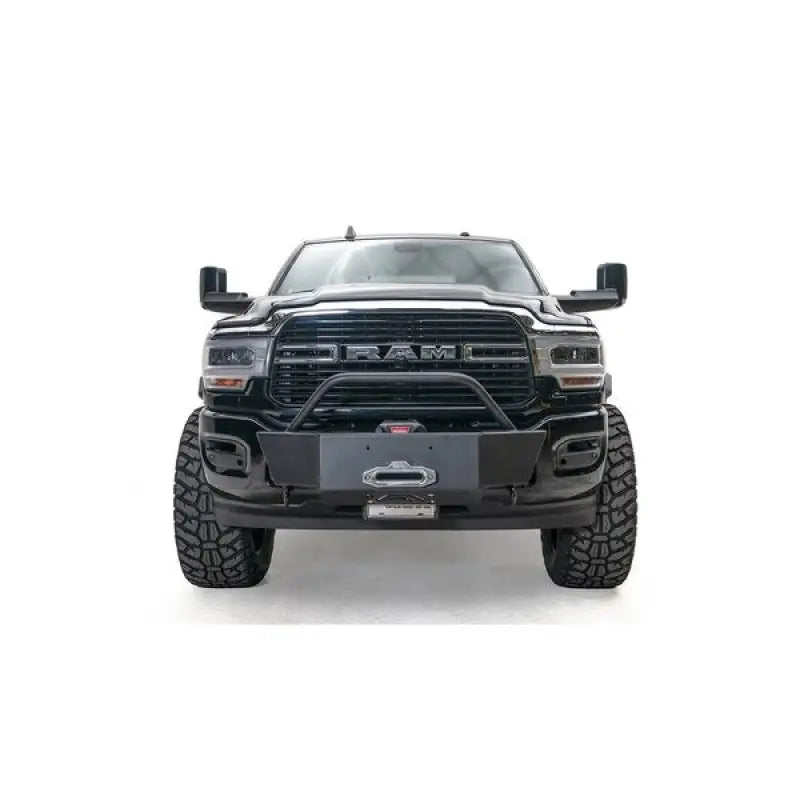 Front view of a 2019+ Ram 2500 with DR19-N4470-1 Fab Fours Full Guard Winch Mount, providing full front-end protection and integrated winch mount, ideal for off-road adventures. Upgrade your truck accessories with rugged, reliable exterior parts. Winches & Hitches,AVADA - Best Sellers,Must Haves