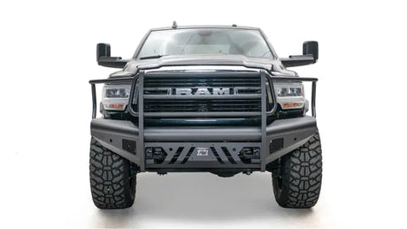 Front view of a truck with DR19-Q4460-1 Fab Fours Black Steel Elite Front bumper, showcasing its durable steel construction and sleek design for enhanced front-end protection.