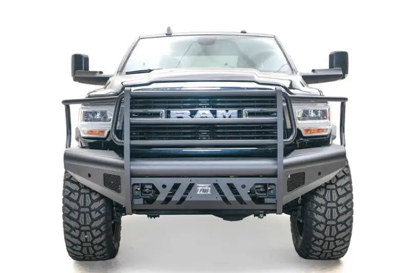 DR19-Q4460-1 Fab Fours Black Steel Elite Front bumper on a RAM truck, showcasing its sleek design and rugged durability.
