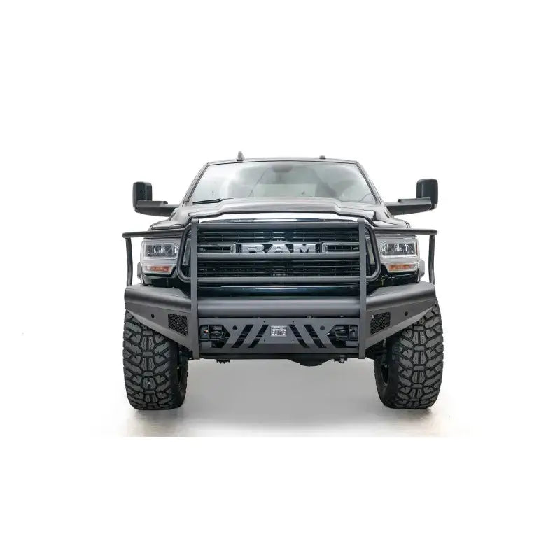Front view of a truck with DR19-Q4460-1 Fab Fours Black Steel Elite Front bumper, showcasing its durable steel construction and sleek design for enhanced front-end protection.