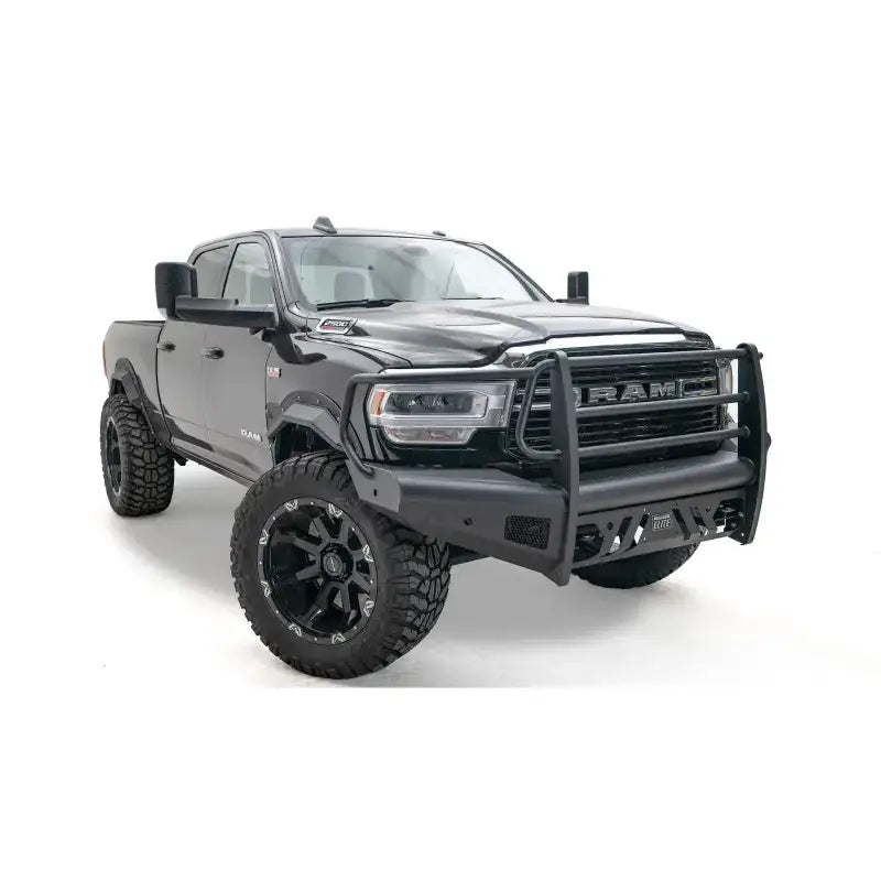 DR19-Q4460-1 Fab Fours Black Steel Elite Front bumper on a rugged, black RAM truck showcasing enhanced front-end protection and aggressive style.