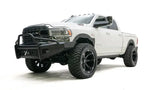 DR19-Q4462-1 Fab Fours Black Steel Elite Front bumper on a white off-road truck.