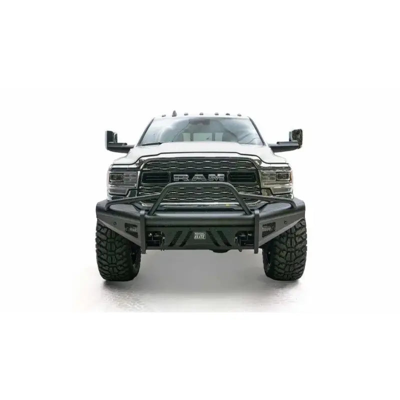 Front view of a white RAM truck equipped with a Fab Fours Black Steel Elite Front bumper, showcasing its durable and rugged black steel construction against a white background.