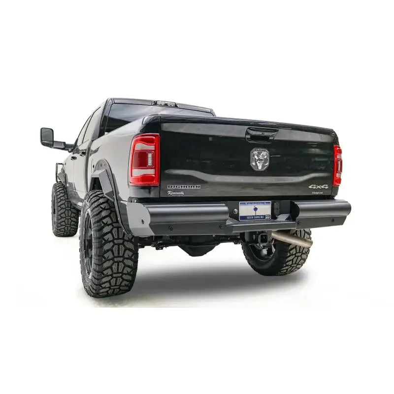 DR19-U4450-1 Fab Fours Black Steel Elite Rear bumper on a black truck, showcasing its high-quality black steel construction and rugged, aggressive design, ideal for off-road challenges and superior rear-end protection, Bumpers, Grilles & Guards, AVADA - Best Sellers, Must Haves