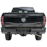 Rear view of a black 2019 Dodge Ram 2500-3500 featuring the Fab Fours DR19-W4451-1 Premium rear bumper, showcasing robust design and high-quality construction.