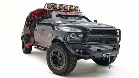 DR19-X4450-1 Fab Fours Matrix Full Guard on a 2019 Dodge HD truck; durable front-end protection; enhances rugged, industrial look; ideal for off-road adventures.