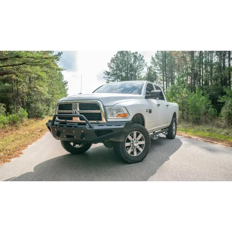 DR94-RS1562-1 Fab Fours bumper on a white Dodge 2500-3500 HD, designed for off-road and heavy-duty use, enhancing vehicle protection and rugged styling, Bumpers, Grilles & Guards, AVADA - Best Sellers, Must Haves