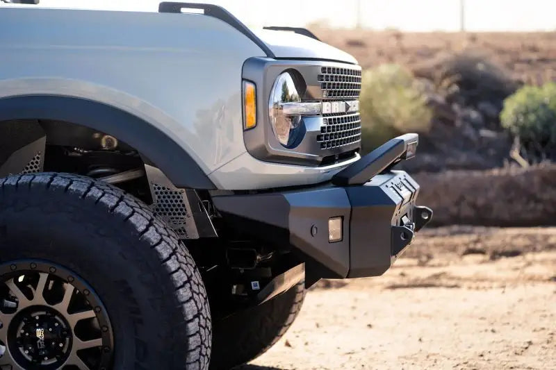 DV8 Offroad MTO Series front bumper for 2021+ Ford Bronco, winch-capable with optional bull bar and aux light openings.