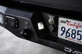DV8 Offroad MTO Series Rear Bumper for 2021-2023 Ford F-150 showing license plate area and lighting features.