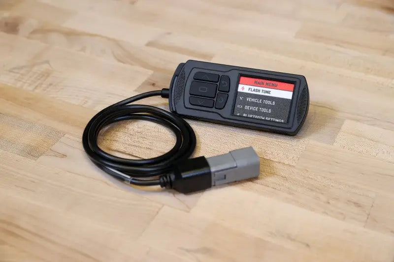 Black Dynojet Power Vision 3 device for Maverick Trail Sport with OBD-II cable