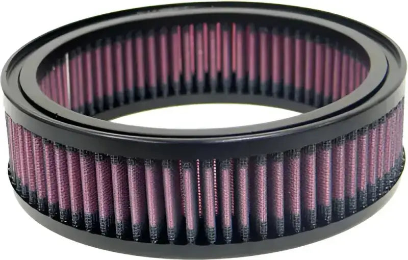 Round air filter with black frame and red media for increased performance RV and truck parts