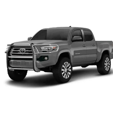 Gray Toyota Tacoma pickup with E0029S Trailfx grille guard for extra protection