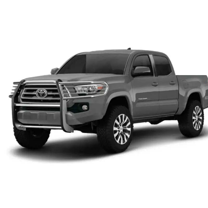 Gray Toyota Tacoma pickup with E0029S Trailfx grille guard for extra protection