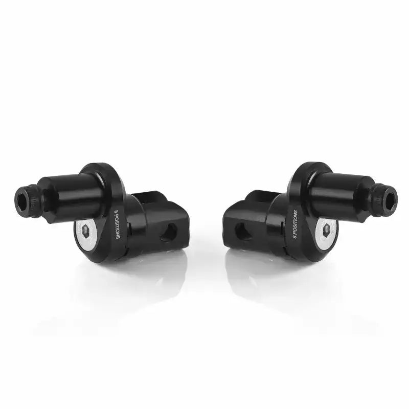 Black metal eccesntric footpeg mounted on eccesntric footpeg mount kit for motorcycle riding
