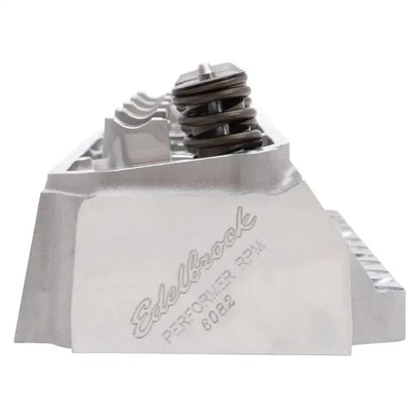Silver Edelbrock Performer RPM 6082 cylinder head with valve springs for BB Chrysler engine
