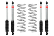Silver shock absorbers and springs for Eibach pro-truck lift kit on Ram 2500 4WD