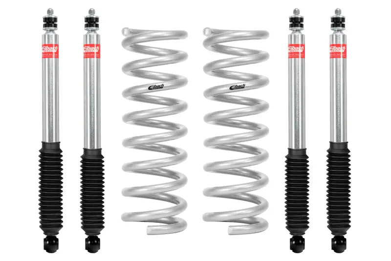 Silver shock absorbers and springs for Eibach pro-truck lift kit on Ram 2500 4WD