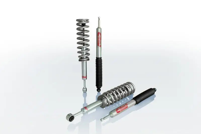 Silver and black shock absorbers with springs from Eibach Pro-Truck Lift for Silverado 1500