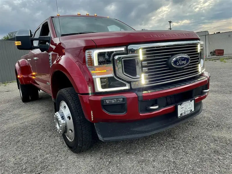 Red Ford Super Duty pickup with EMPSCG2SMS4D M Power Fascia for a bold look