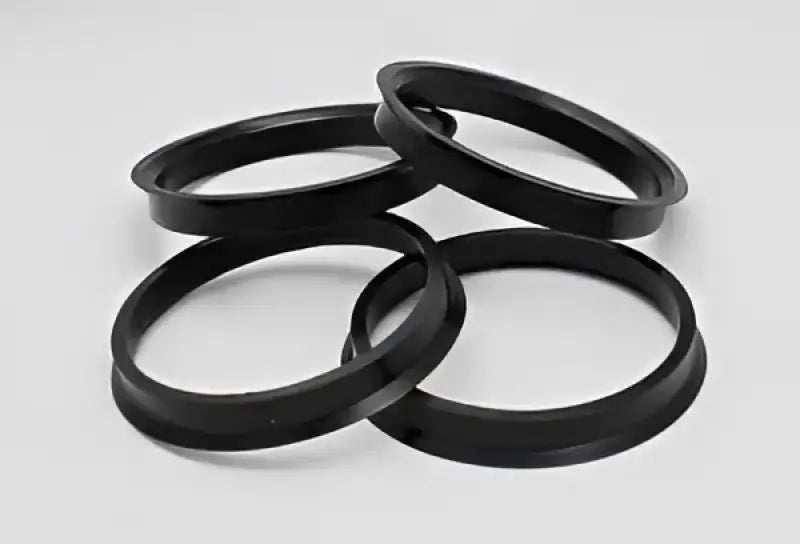 Four black hub rings with perfect fit and outer diameter for Toyota Enkei wheels