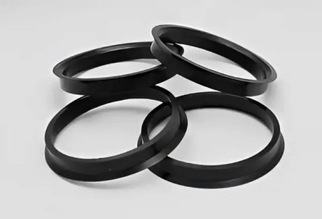 Four black hub rings with perfect fit and outer diameter for Toyota Enkei wheels