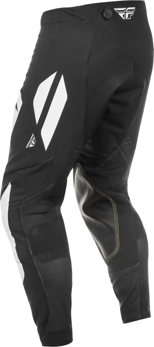 Black motocross racing pants with white and gold accents for RV parts & accessories or truck parts