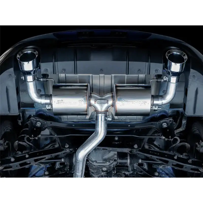 "Exhaust System Kit Stainless Steel; Without Muffler; Single Exhaust With Dual Outlet; Rear Exit; 5 Inch Chrome Silver Tips installed on a vehicle showcasing the AWE logo and 180 Technology resonators."