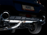 "Exhaust System Kit Stainless Steel; Without Muffler; Single Exhaust With Dual Outlet; Rear Exit; 5 Inch Chrome Silver Tips by AWE, shown installed on a rear view of a car."