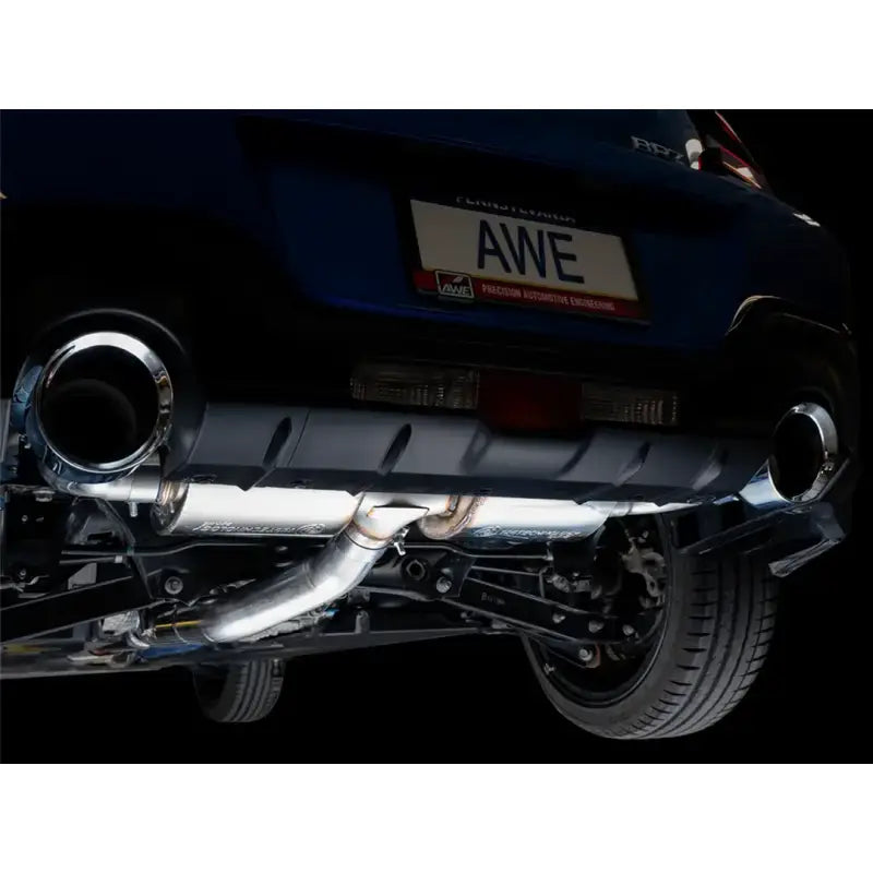 "Exhaust System Kit Stainless Steel; Without Muffler; Single Exhaust With Dual Outlet; Rear Exit; 5 Inch Chrome Silver Tips by AWE, shown installed on a rear view of a car."