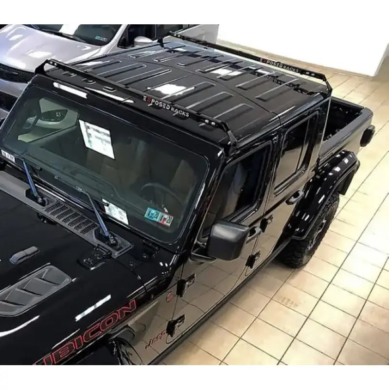 Black Jeep Wrangler Rubicon with Exposed Rack 8-00-9755-BK roof rack kit and spare tire