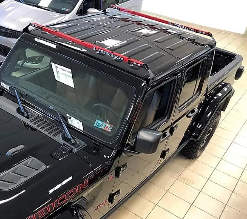 2019 Jeep Gladiator Rubicon black pickup with red accents and Exposed Rack 8-00-9755-RD roof rack kit