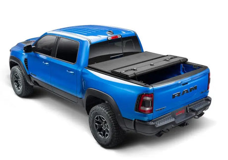 Blue Ram pickup truck with Solid Fold ALX tonneau cover on 5ft 7in bed