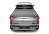 Silver pickup truck with solid fold alx bed cover for Chevy/GMC Silverado/Sierra 1500