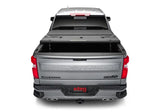 Silver pickup truck with tonneau cover featuring Extang Solid Fold ALX for Silverado 1500