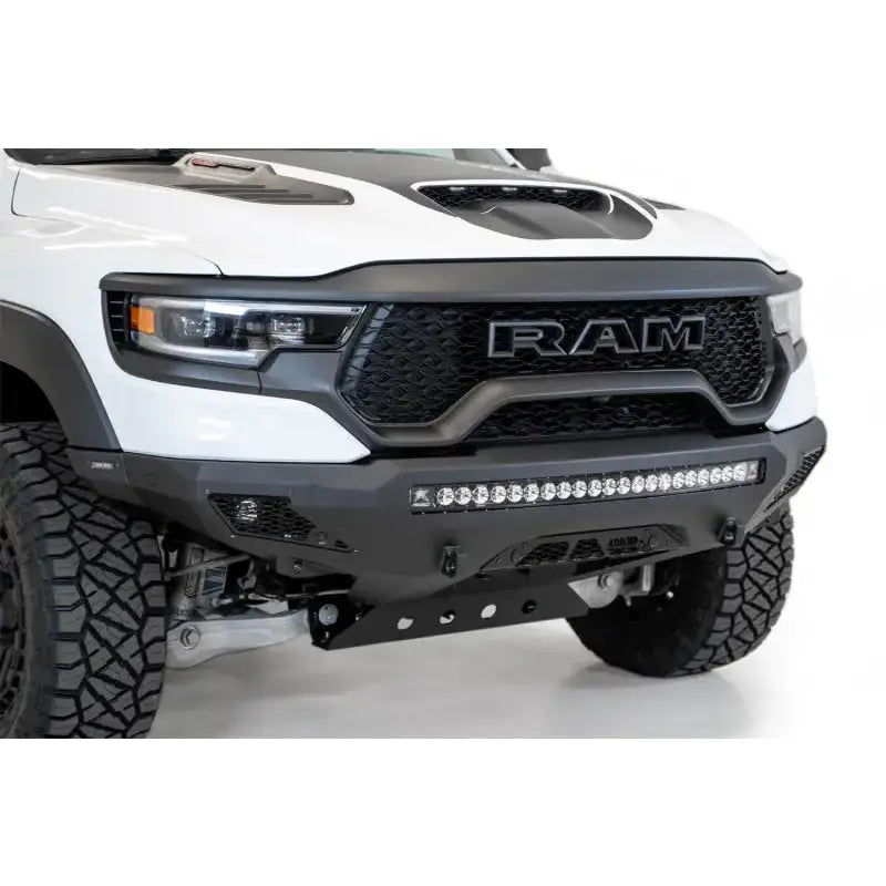 F620153030103 A.Desert Des Stealth Fighter Front Bumper for RAM trucks, featuring a robust black design with integrated LED light bar.