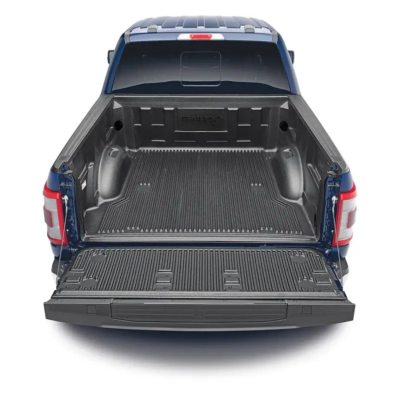 F65U15X Trailfx Bedliner installed in a Ford F150 truck bed, providing unmatched protection against scratches, dents, and rust. Durable and custom-designed for 6'5" truck beds, ideal for RV, Automotive, Powersports, off-road, marine, exterior, truck accessories, and interior use. Truck & Automotive, Truck Bed Accessories, AVADA - Best Sellers