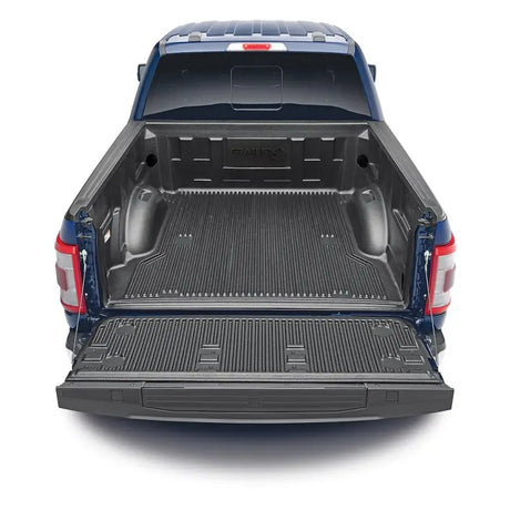 F65U15X Trailfx Bedliner installed in a Ford F150 truck bed, providing unmatched protection against scratches, dents, and rust. Durable and custom-designed for 6'5" truck beds, ideal for RV, Automotive, Powersports, off-road, marine, exterior, truck accessories, and interior use. Truck & Automotive, Truck Bed Accessories, AVADA - Best Sellers