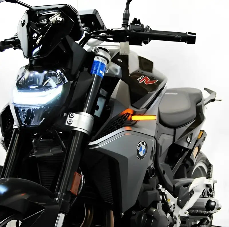 Gray and black BMW motorcycle with F900R-FB LED turn signals for better visibility