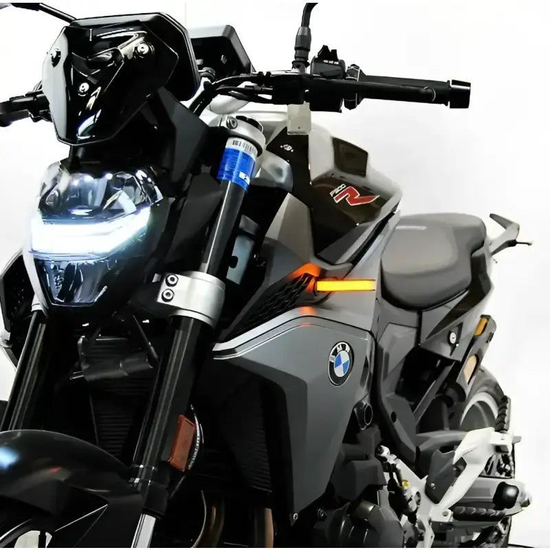 Gray and black BMW motorcycle with F900R-FB LED turn signals for better visibility