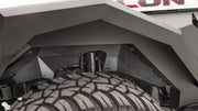 Fab Fours JL1002-1 18 Jp Jl Inner Fender on a Jeep Wrangler with rugged tire and enhanced protection.