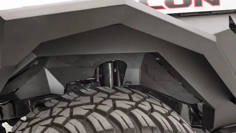 Fab Fours JL1002-1 18 Jp Jl Inner Fender installed on Jeep Wrangler, showcasing enhanced protection and rugged style.