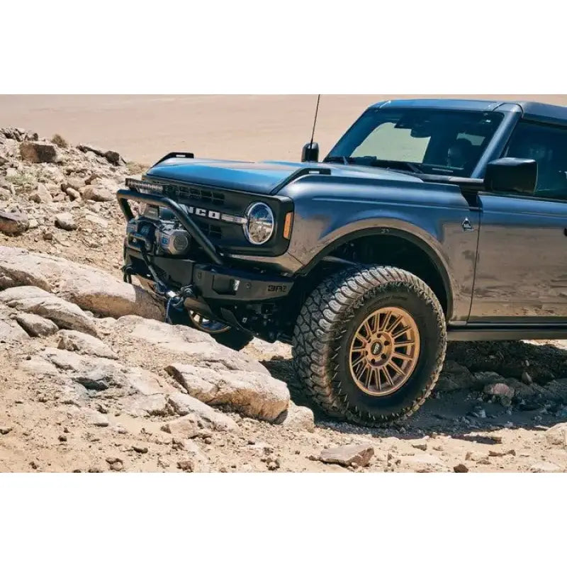 Gray Ford Bronco off-roading with FB-5100 Body Armor and fender flares