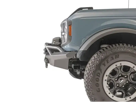 FB21-B5252-1 Fab Fours Stubby Front Bumper enhancing vehicle's rugged appearance and durability on rough terrain.