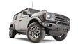 FB21-D5252-1 Fab Fours Vengeance Front Bumper on a rugged off-road vehicle, showcasing heavy-duty construction and aggressive styling.
