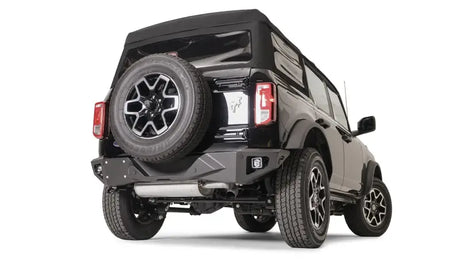 FB21-E5251-1 Fab Fours Vengeance Rear Bumper on a rugged off-road vehicle flaunting enhanced rear-end protection and aggressive styling.