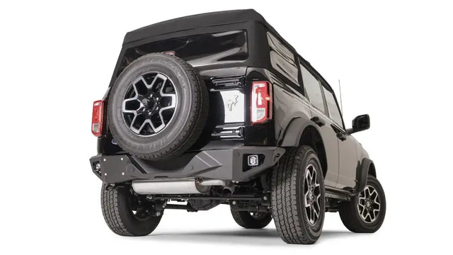 FB21-E5251-1 Fab Fours Vengeance Rear Bumper on a rugged off-road vehicle flaunting enhanced rear-end protection and aggressive styling.