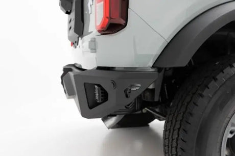 Fab Fours Vengeance Rear Bumper FB21-E5251-1 installed on a vehicle, showcasing its rugged design and superior protection.